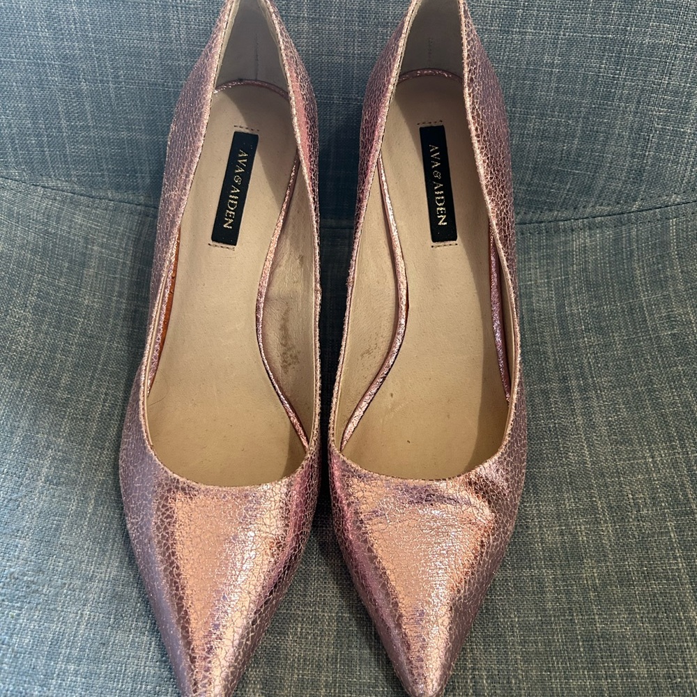 Pink stilettos gently worn